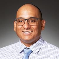 portrait of Evan T Colmenero, DO