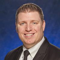 portrait of Joshua L Houser, MD